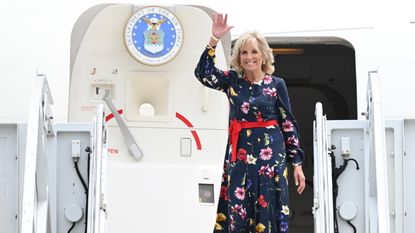 US First Lady Jill Biden waves as she walks off the plane as she arrives in Savannah, Georgia on July 8, 2021.