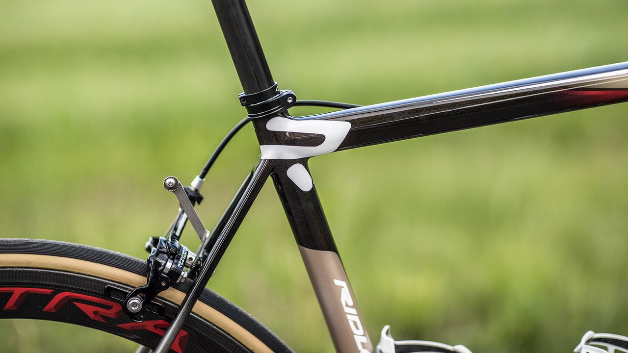A neat number plate mount keeps it clean at the rear end of the bike