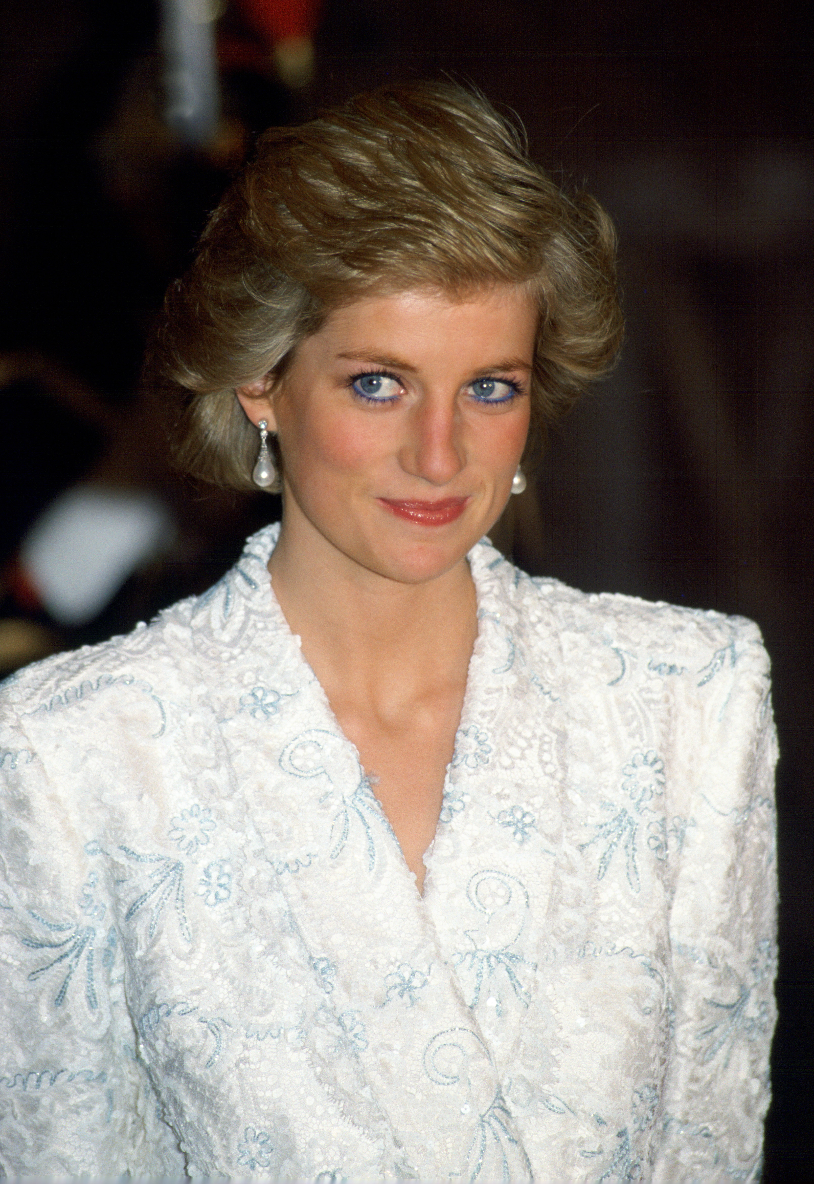 Diana, Princess Of Wales, Wearing A White And Blue Lace And Sequin Evening Coat-dress (Photo by Tim Graham Photo Library via Getty Images)