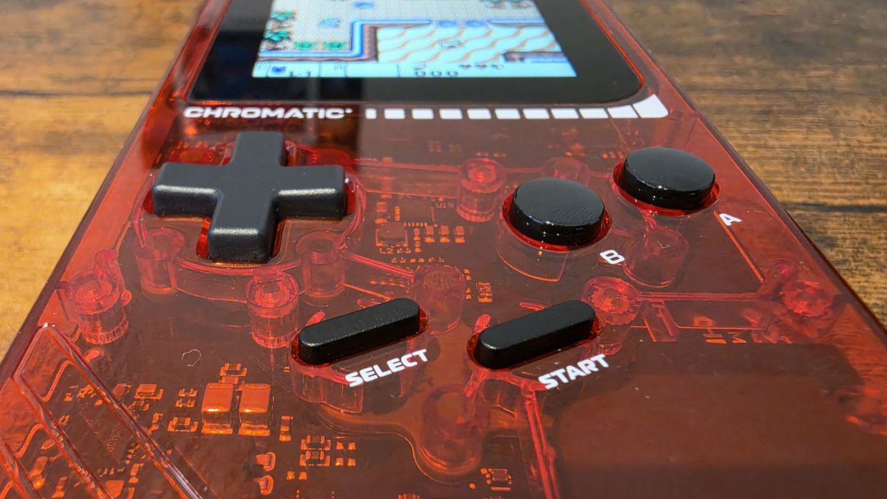 A close up of the ModRetro Chromatic Transparent from the bottom so you can see all the inside electronics