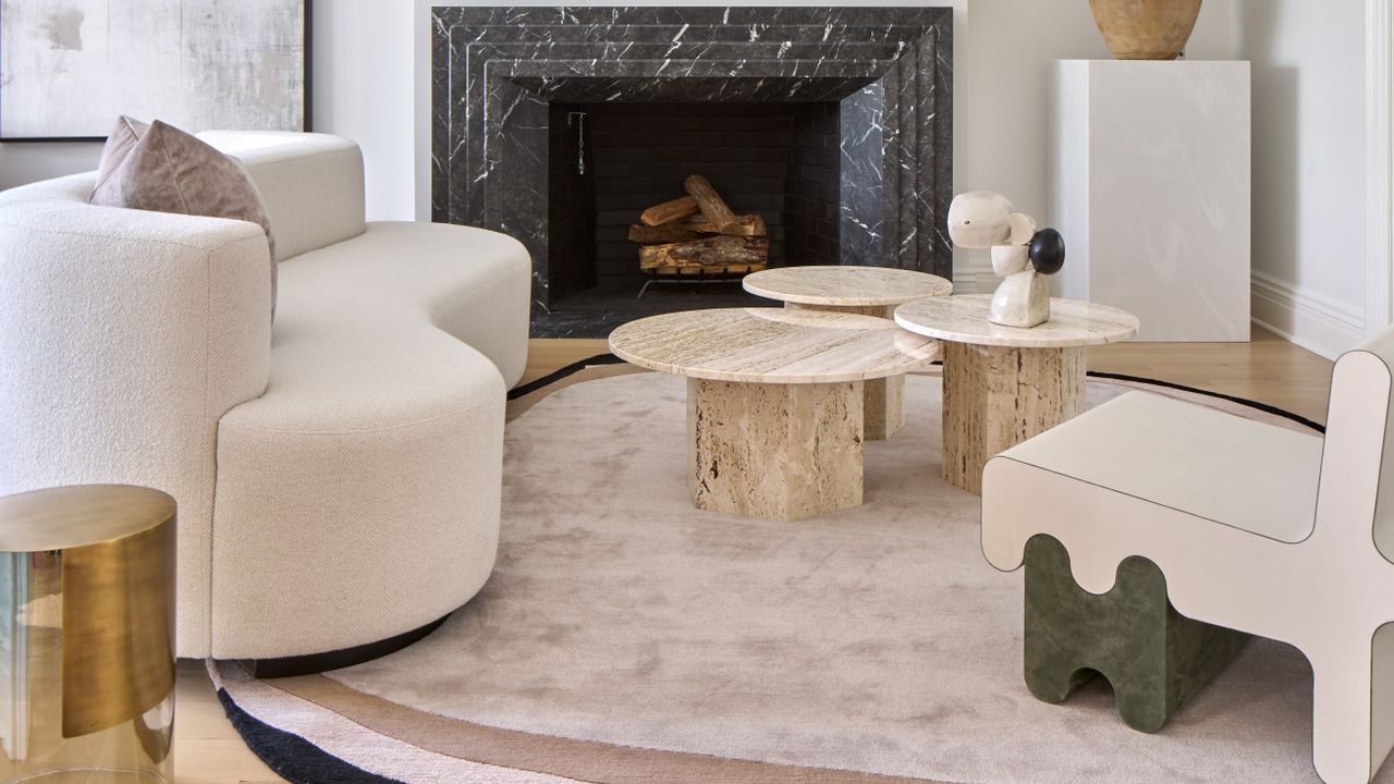 A living room with plush pink rug underfoot