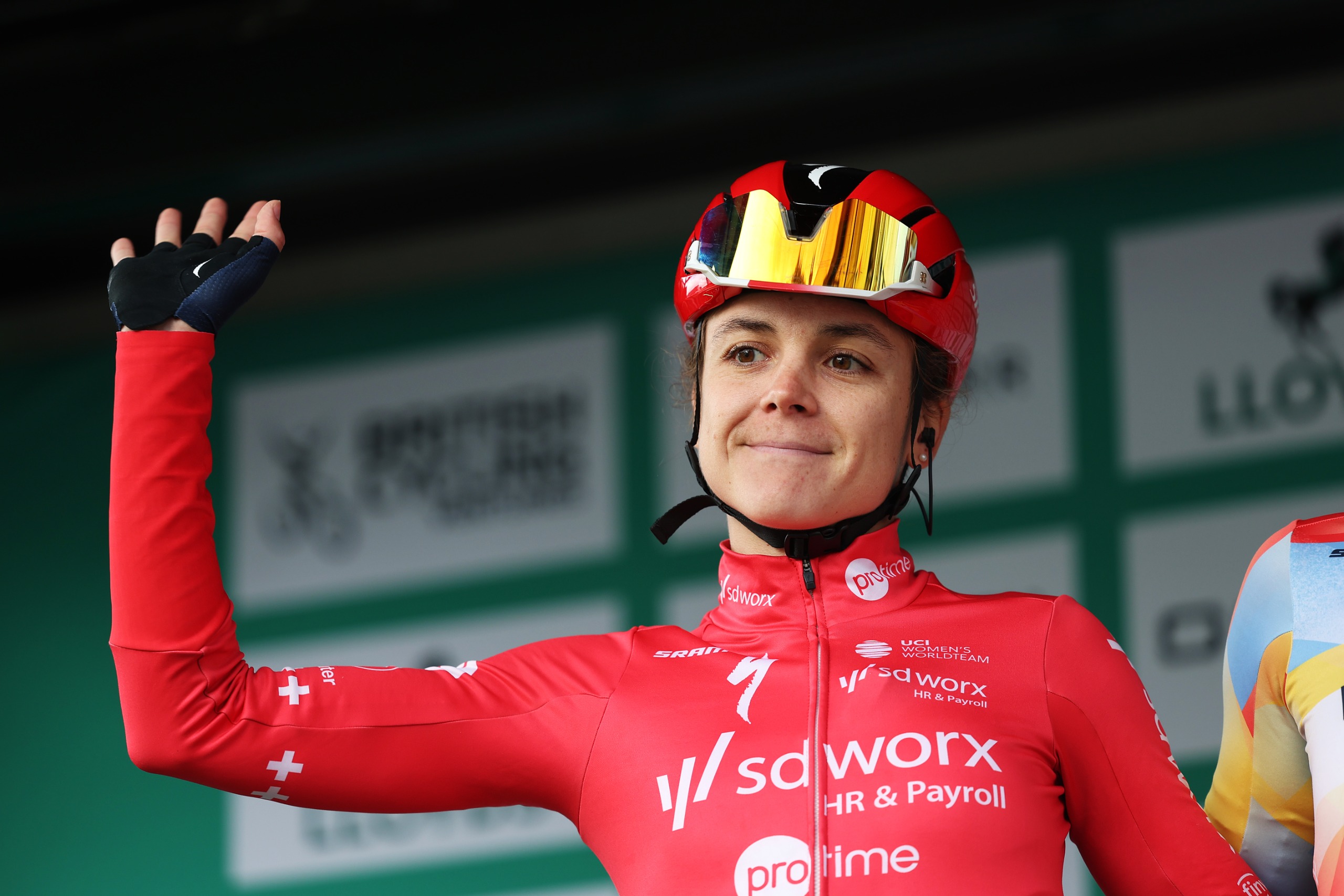 Steffi H&auml;berlin greets fans on stage ahead of stage 1 of the 2026 Tour of Britain Women