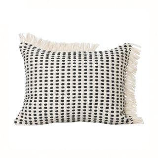 A black and white woven outdoor cushion