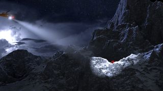 A helicopter searching for hikers inside a bothy bag on a mountain at night