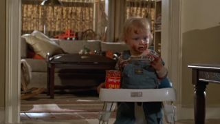 A scene from Mr. Mom of a baby eating chili
