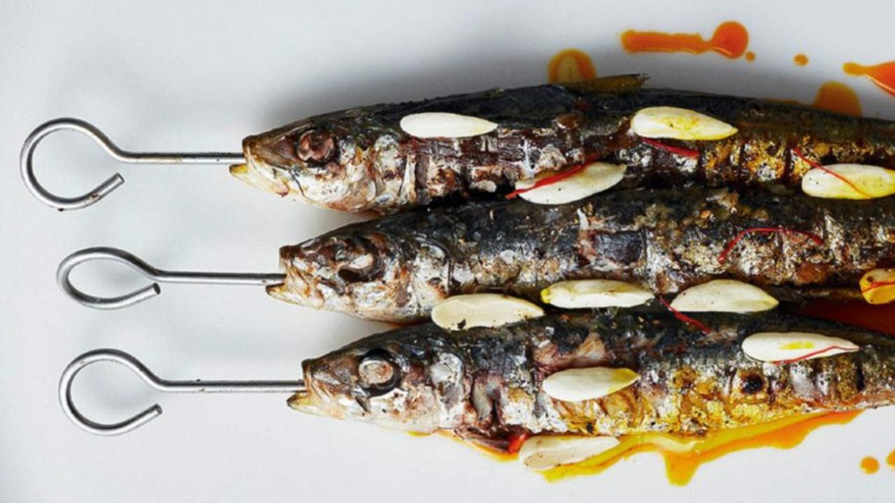 Charcoal sardines in saffron vinegar and almond oil