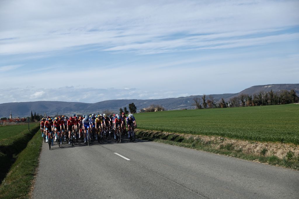 The pack of cyclist rides during the 5th stage of the 81st Paris Nice cycling race 2125 km between SaintSymphoriensurCoise and SaintPaulTroisChateaux southeastern France on March 9 2023 Photo by AnneChristine POUJOULAT AFP Photo by ANNECHRISTINE POUJOULATAFP via Getty Images