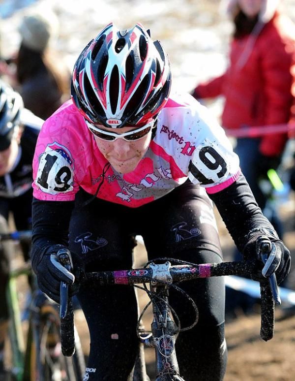 Kari Studley (Velo Bella) climbing in the saddle.