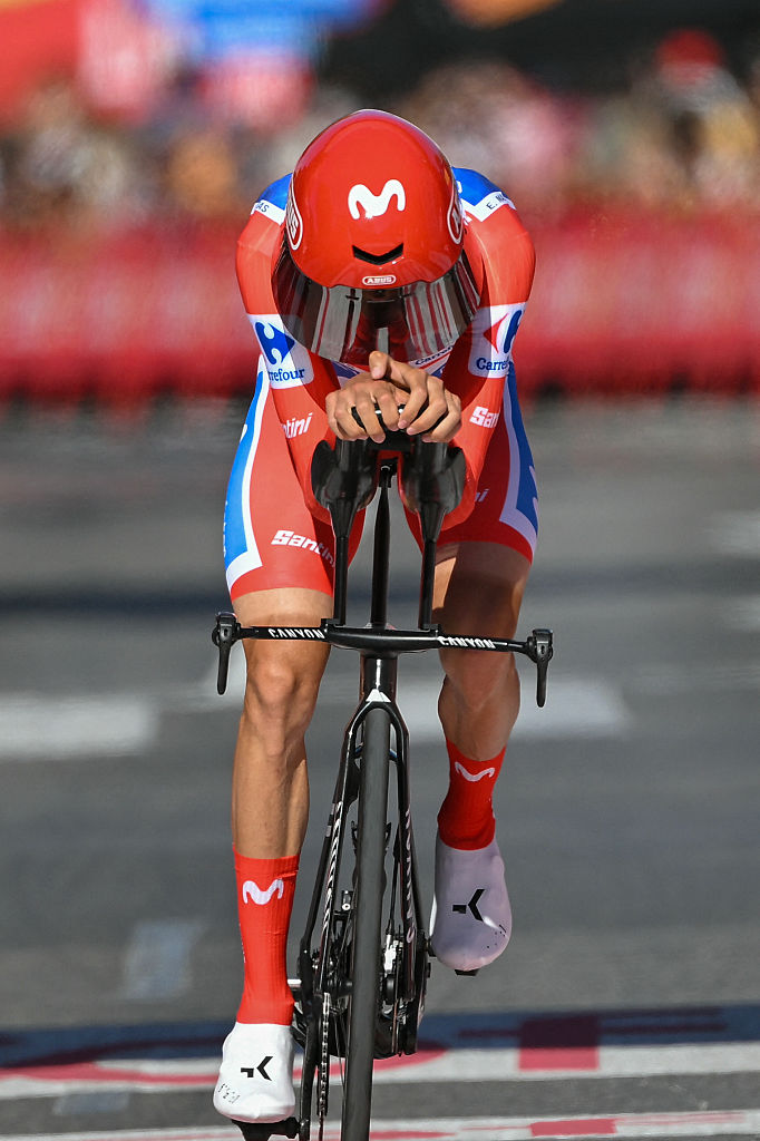 Overall race leader Team Movistar's Spanish rider Enric Mas crosses the finish line of the 18th stage of the Vuelta a Espana 2026 cycling tour, a 32,1 km individual time-trial race between El Puerto de Santa Maria and Jerez de la Frontera, on September 10, 2026. (Photo by JORGE GUERRERO / AFP)