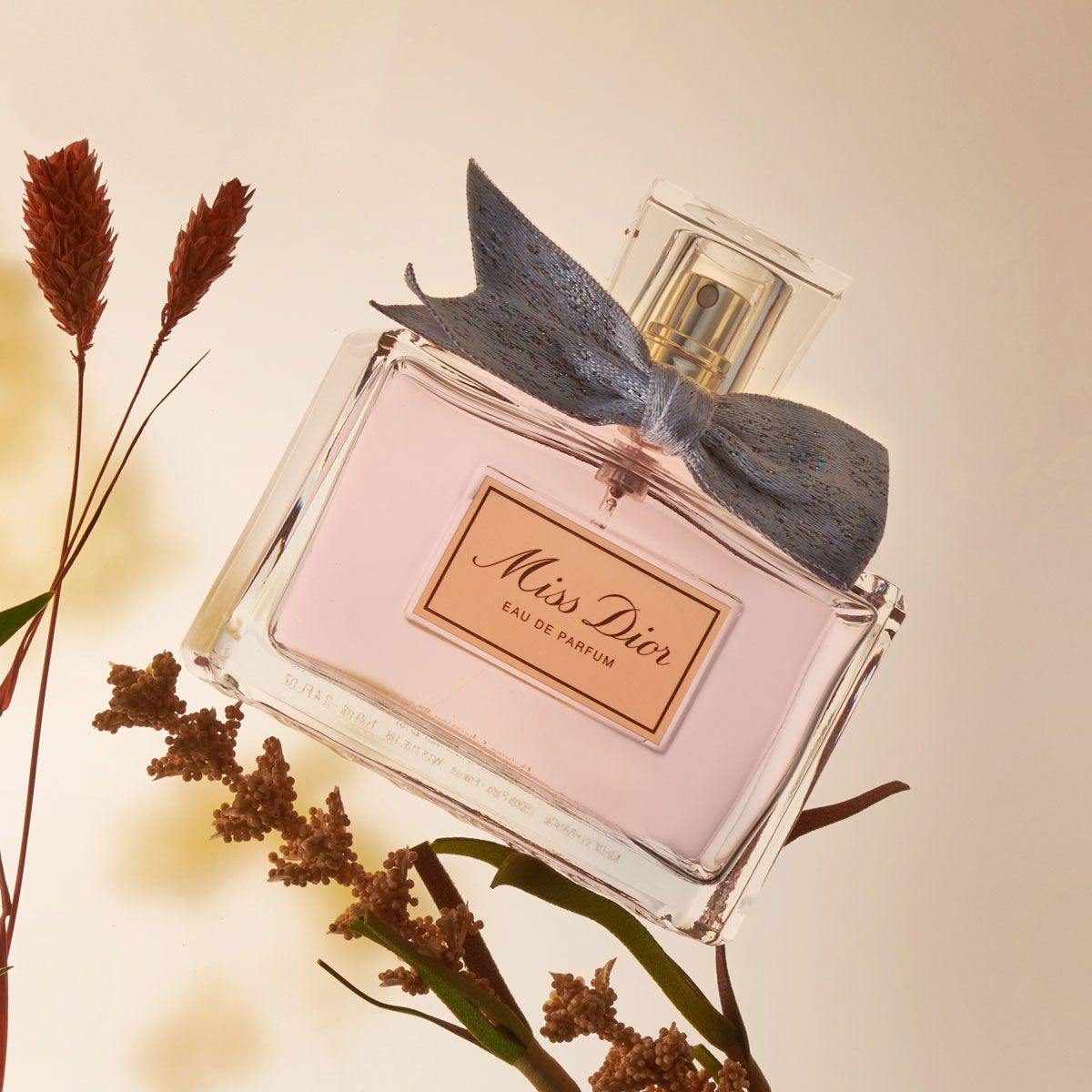 Dior Miss Dior Eau de Parfum floral perfume shot on a flower head