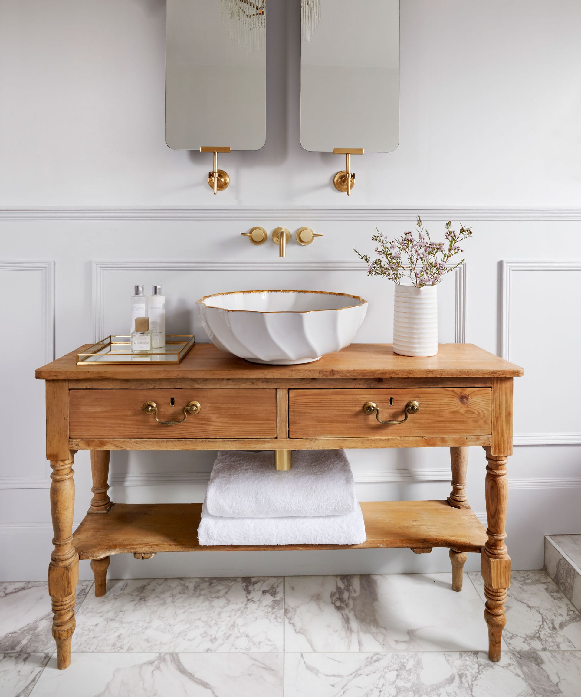 See Joanna Gaines’ small bathroom trick that uses big lights Real Homes