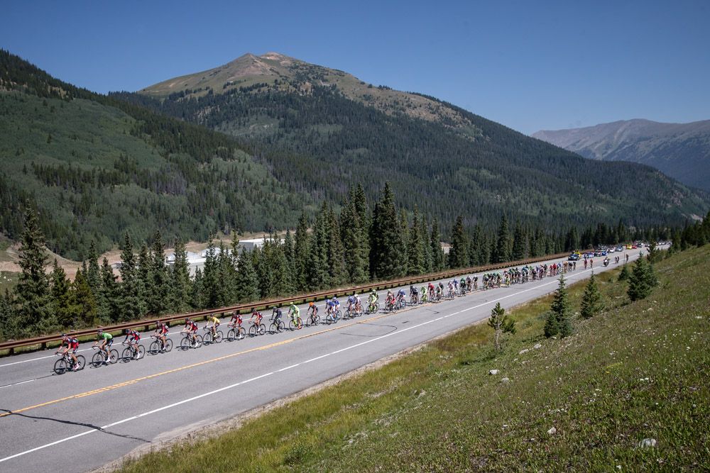 The peloton gets strung out up todays first climb