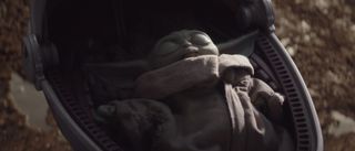 Baby Yoda sleeping in The Mandalorian, in his floating bassinet