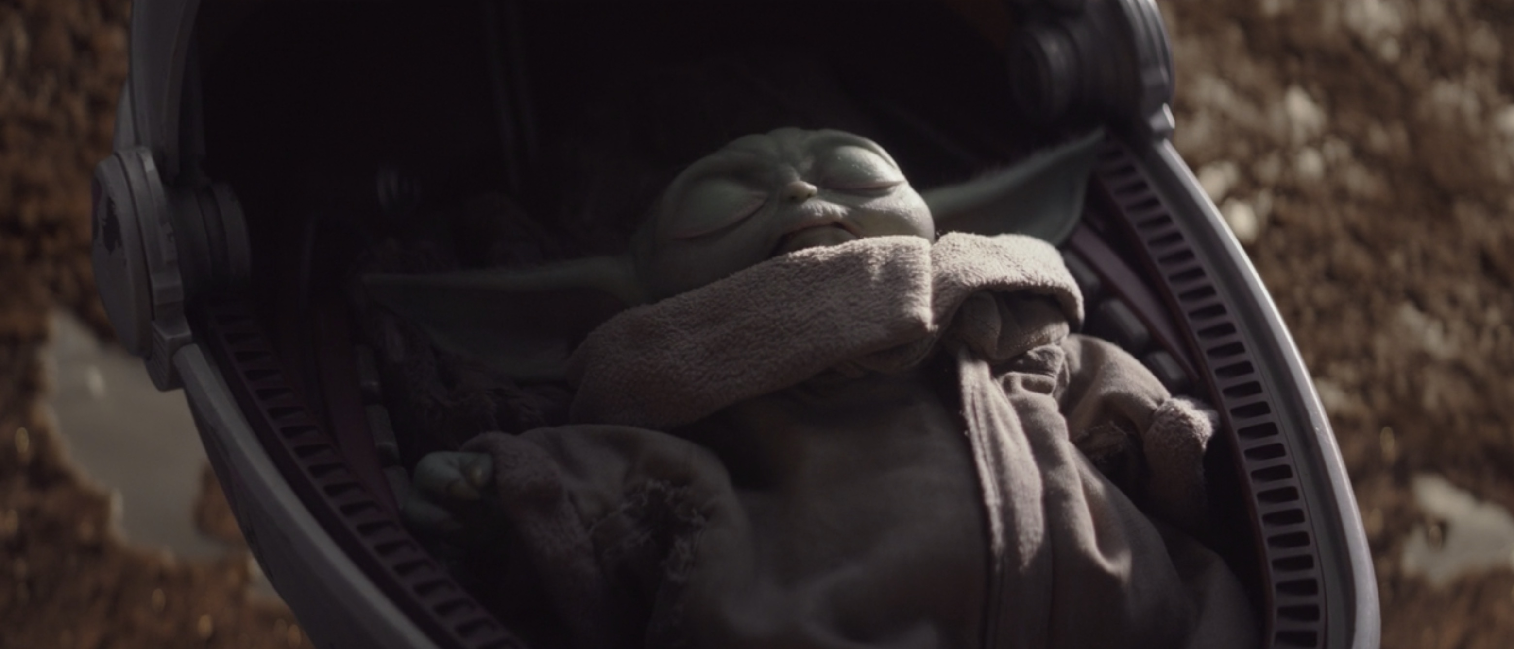 Baby Yoda sleeps in The Mandalorian, in his floating bed