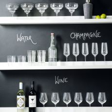 Different types of glassware on open shleving