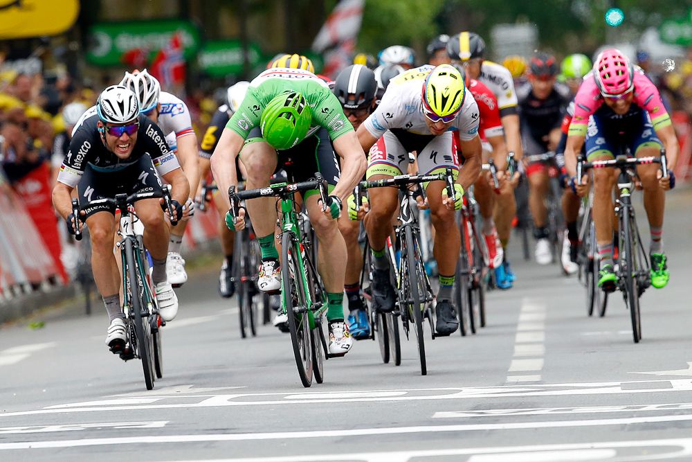 Andre Greipel surges past Mark Cavendish to win stage 5.