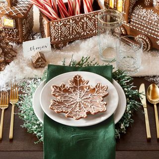 Gingerbread Snowflake Stoneware Appetizer Plate on a dining table. 