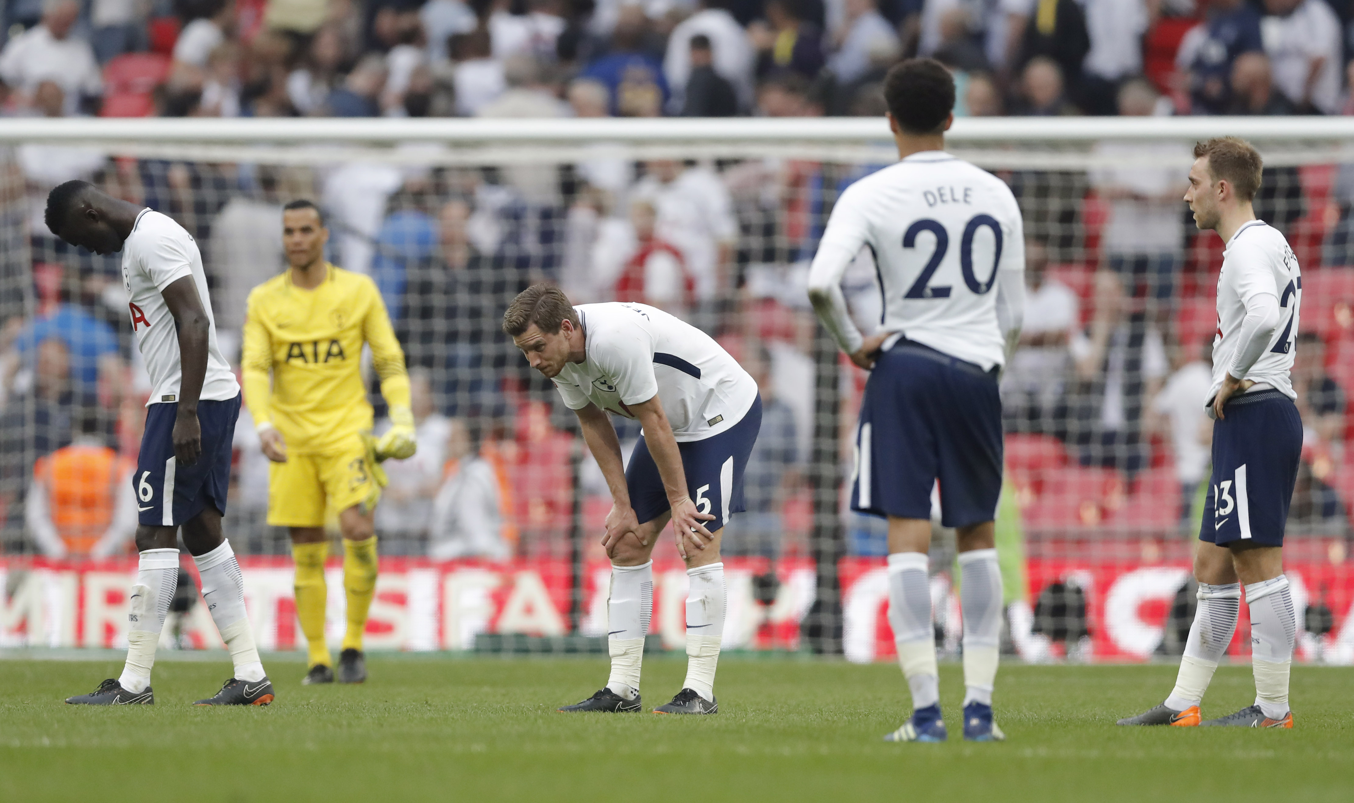 Tottenham players look dejected after defeat to Manchester United in the FA Cup semi-finals in April 2018.
