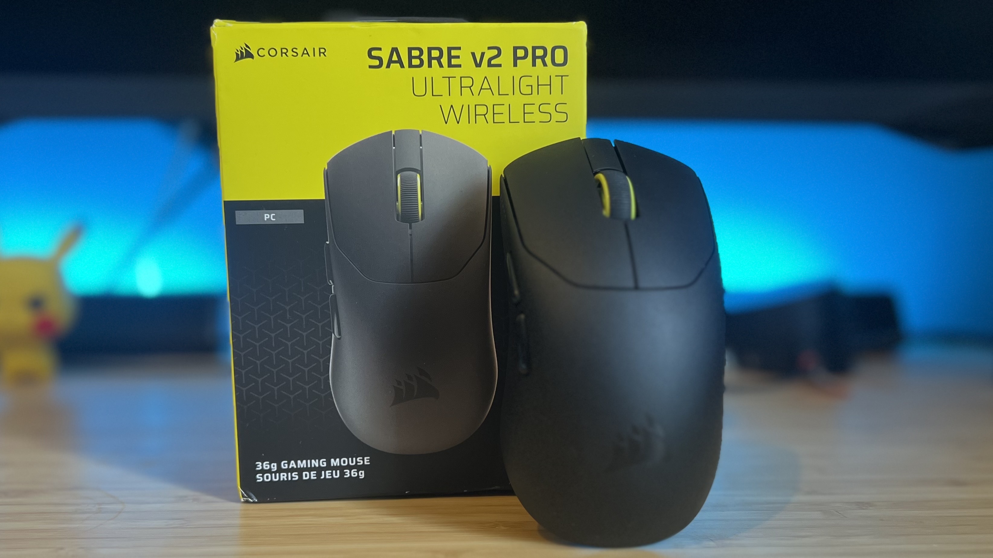 Corsair Sabre Pro V2 Ultralight with packaging on a wooden desk