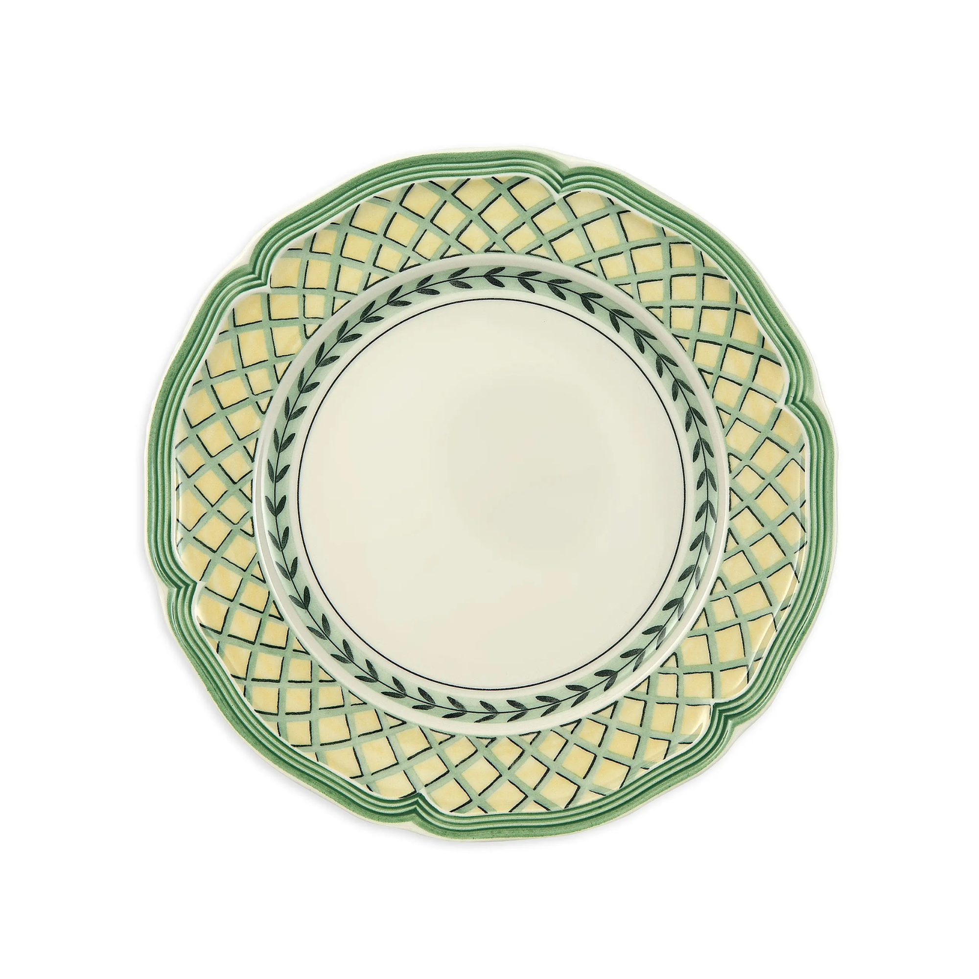 a decorative plate in green and yellow