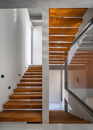 staircase at An Urban House by MISA Architects