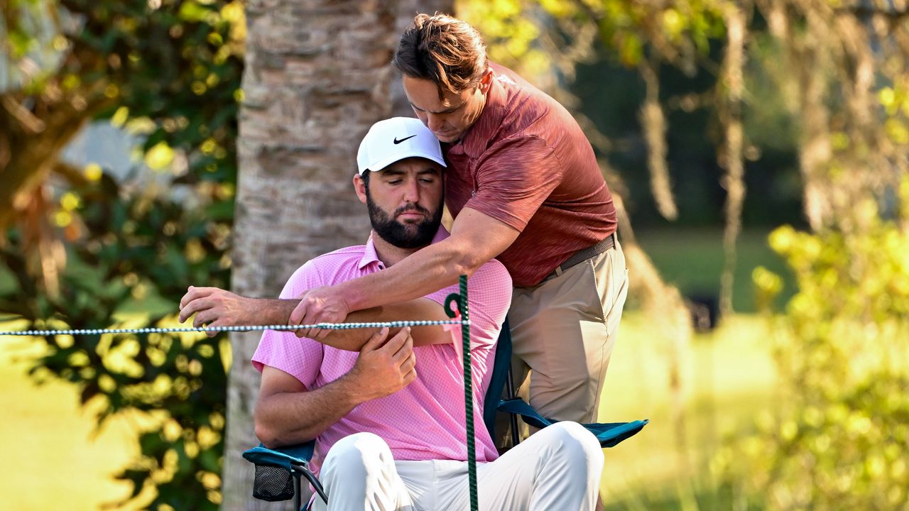 Scottie Scheffler receives treatment at The Players Championship