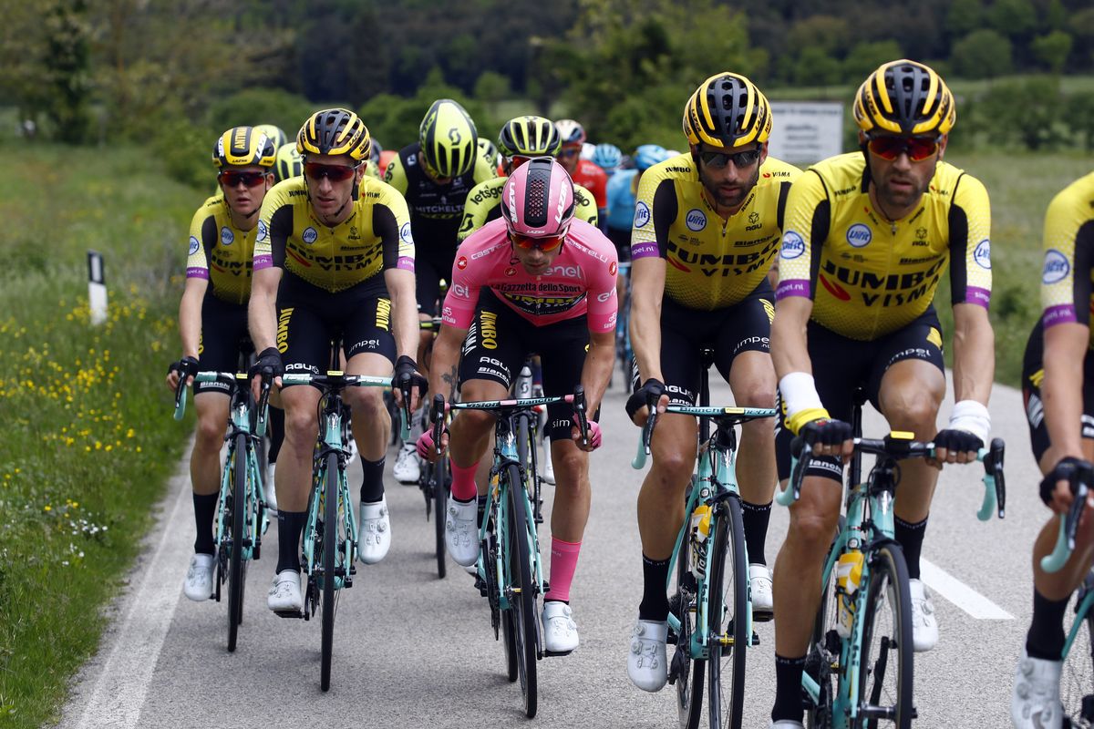 Primoz Roglic (Jumbo-Visma) surrounded by his teammates