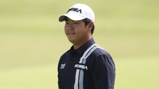 Tom Kim wearing Korea national team outfit while playing at the 2026 Asian Games in Japan