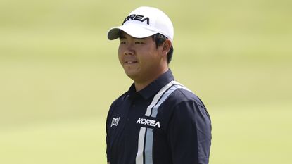 Tom Kim wearing Korea national team outfit while playing at the 2026 Asian Games in Japan
