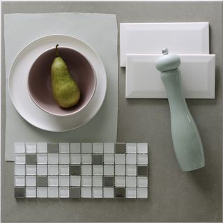 white tiles with mosaic tiles and white plate