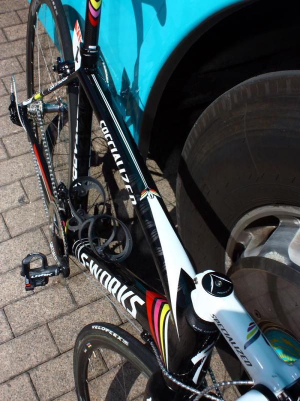 Contador's signature pistol salute is here transformed into more of a butterfly.