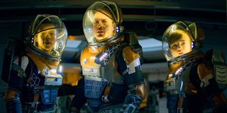 Taylor Russell, Toby Stephens, and Maxwell Jenkins in Lost In Space