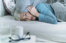 woman worried losing sleep