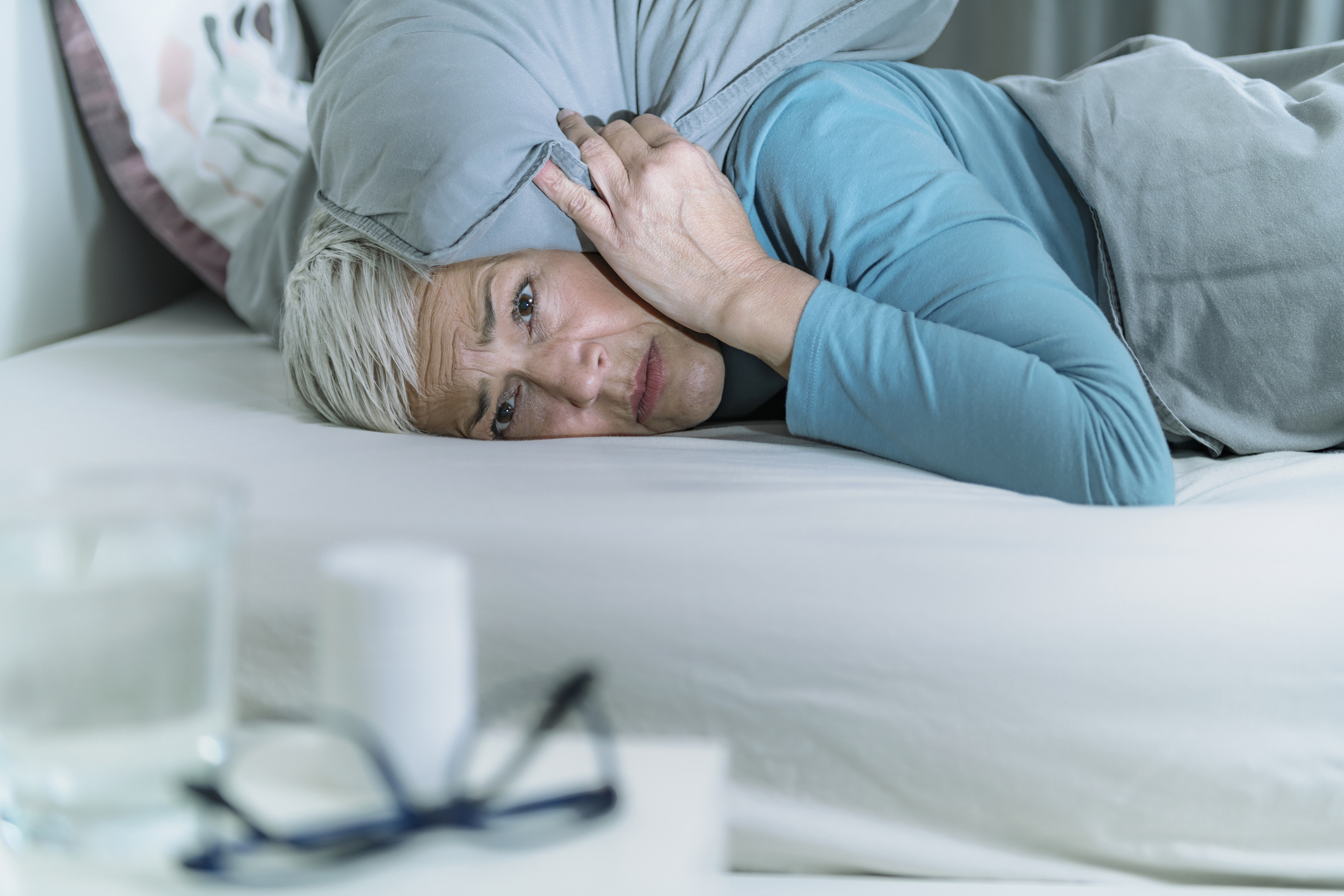 woman worried losing sleep