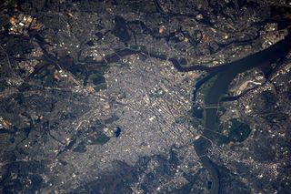 The Pentagon in Washington, D.C., which was also struck by an airplane during the terror attacks on Sept. 11, 2001, is visible in this photo taken from the International Space Station by European Space Agency astronaut Thomas Pesquet on April 11, 2017. The five-sided building, which serves as the headquarters for the U.S. Department of Defense, is visible at the center right of the image, just across the Arlington Memorial Bridge.