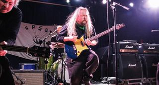 Richard Dawson performs live: his Fidelity Signature JB facilitates a low C tuning, with the bridge being shifted back to accommodate heavy strings. The single pickup is custom-wound by Mojo