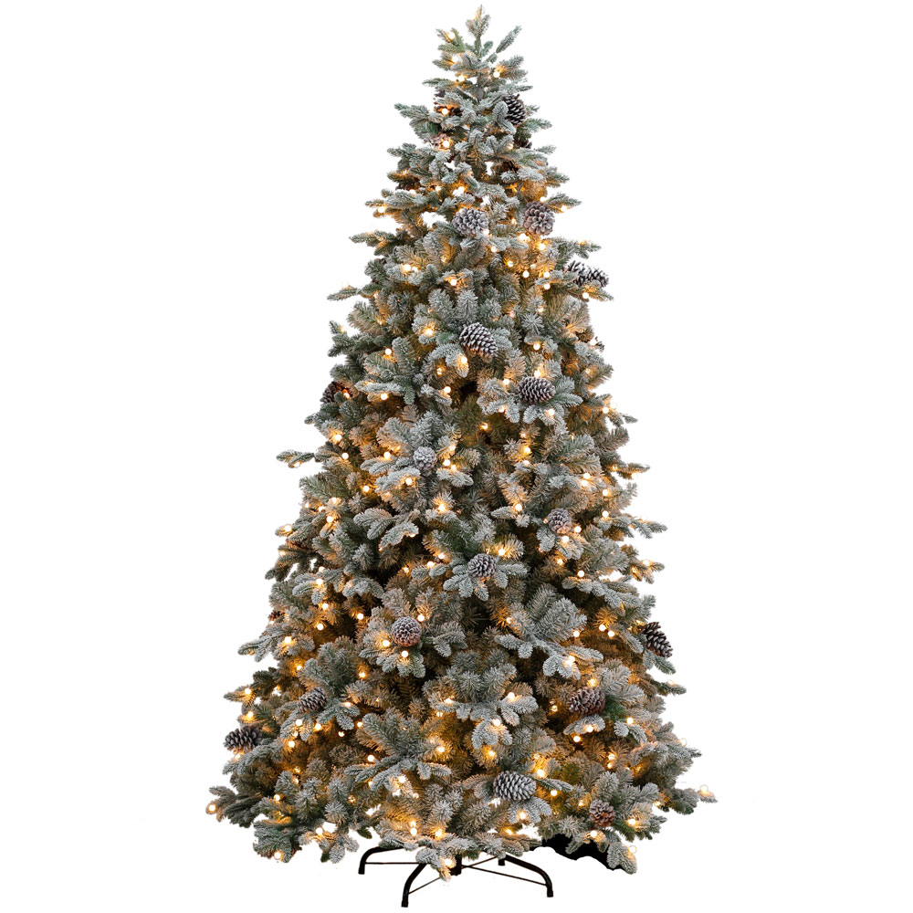 Snowy artificial Christmas tree on a white background