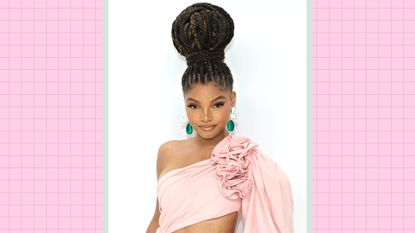  Halle Bailey wears her hair up in braids, and a pink dress and emerald earrings as she attends the CFDA Fashion Awards at Casa Cipriani on November 07, 2022 in New York City. / in a pink and green template