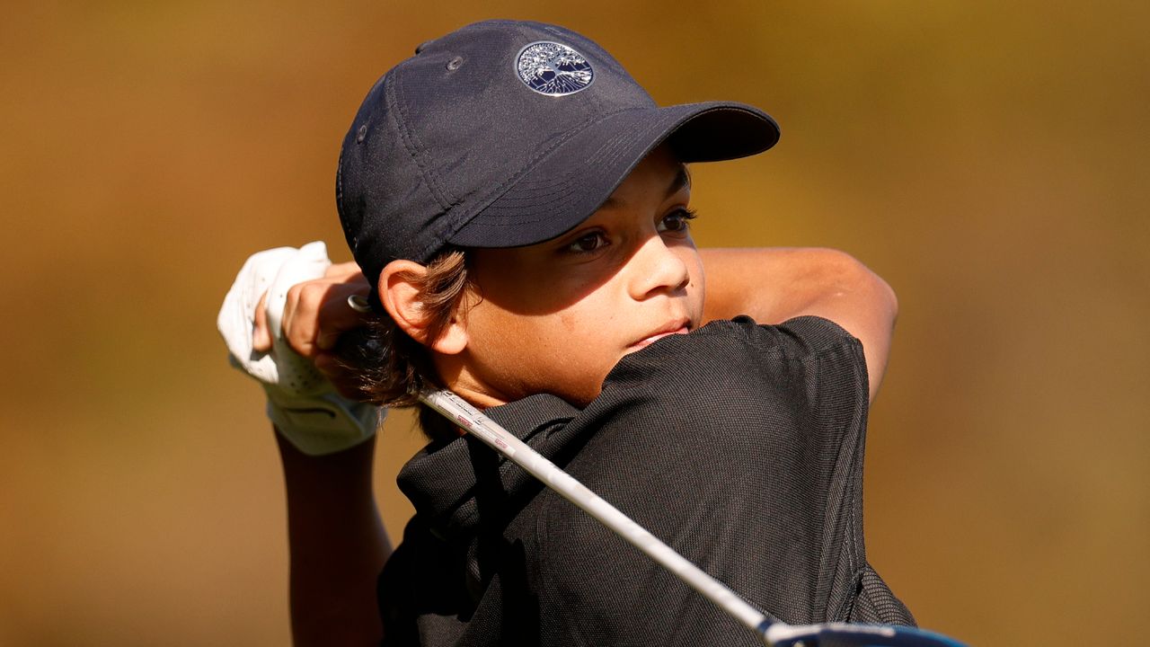 Charlie Woods takes a shot during the Pro-Am of the 2021 PNC Championship at Ritz-Carlton Golf Club Orlando in Florida