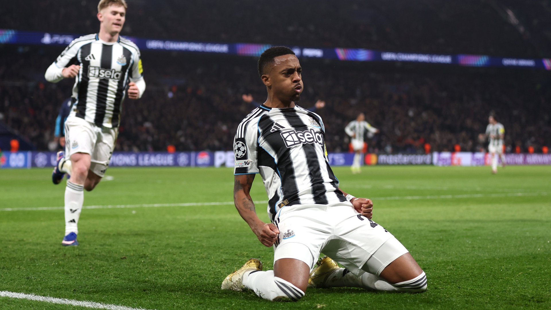 Joe Willock of Newcastle United celebrates scoring a goal during the UEFA Champions League 2025/26.