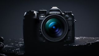OM System OM-1 Mark II camera on a moody, dark diorama