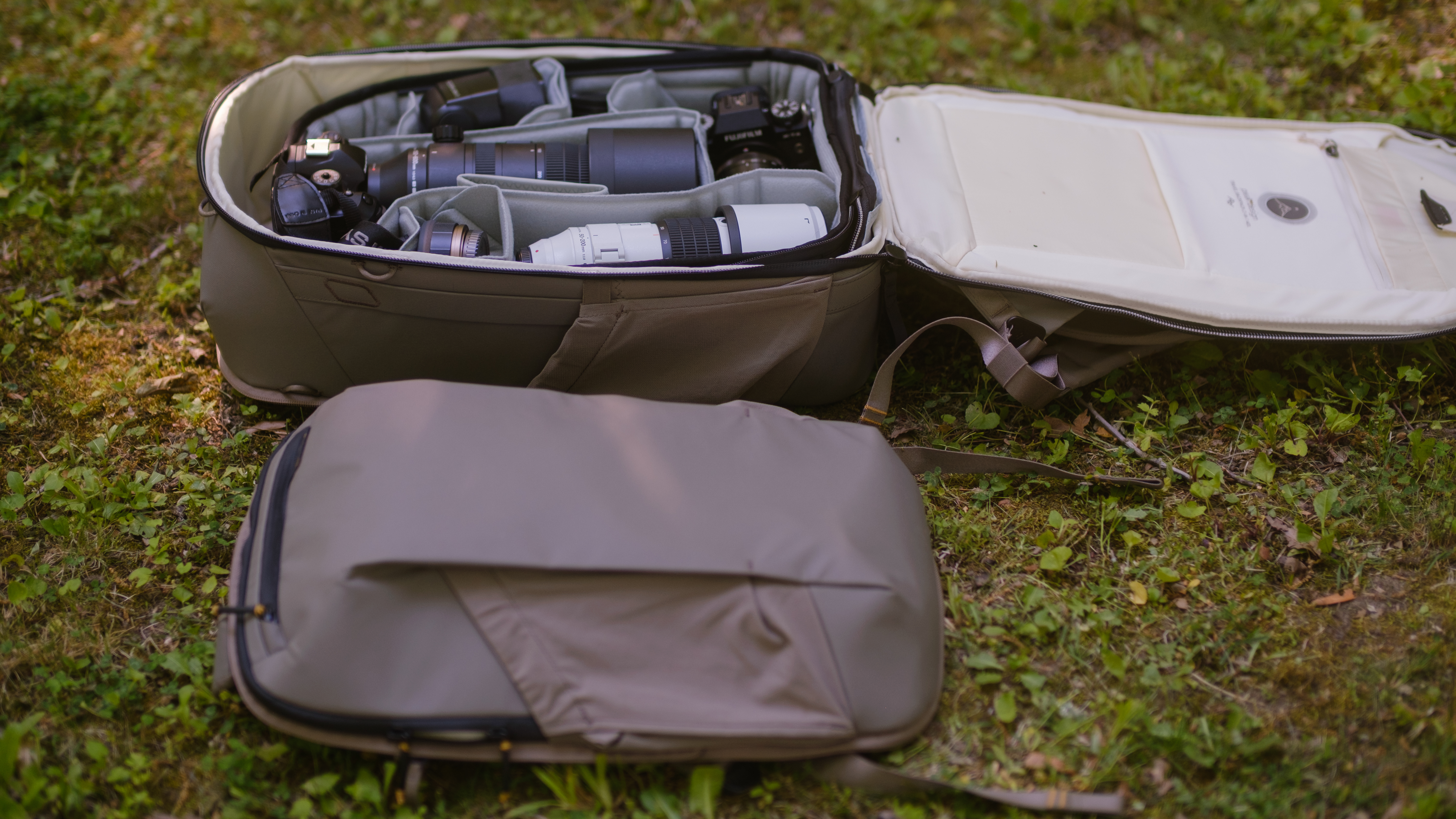The Peak Design Travel 2-in-1 Backpack outdoors used by a photographer
