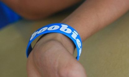 A student sports a controversial cancer bracelet. 