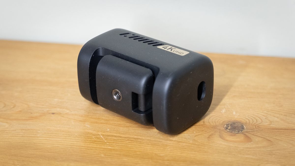 AnkerWork C310 webcam on a wooden surface