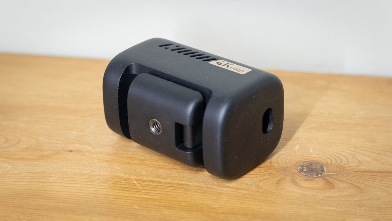 AnkerWork C310 webcam on a wooden surface