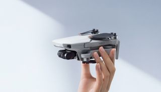 DJI Mini 2 Drone in hand