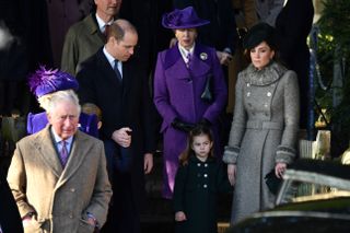 Kate Middleton in a gray Catherine Walker coat on Christmas Day 2019.