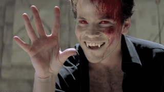 Stephen Dorff smiling with fangs in Blade