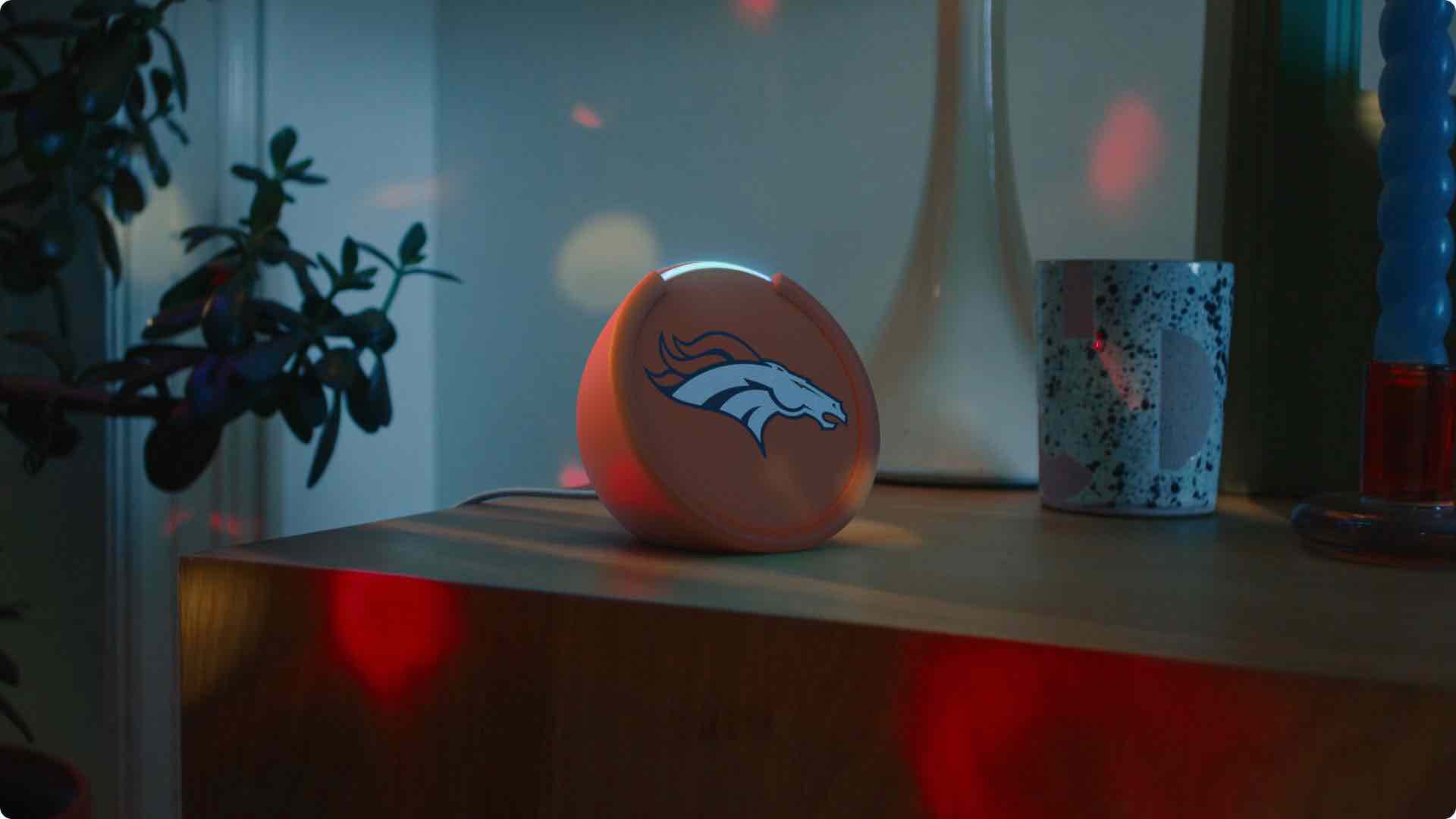 Amazon Echo Pop with LED indicator glowing