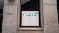 TransUnion logo pictured on a sign outside the company headquarters in Chicago, Illinois, USA.